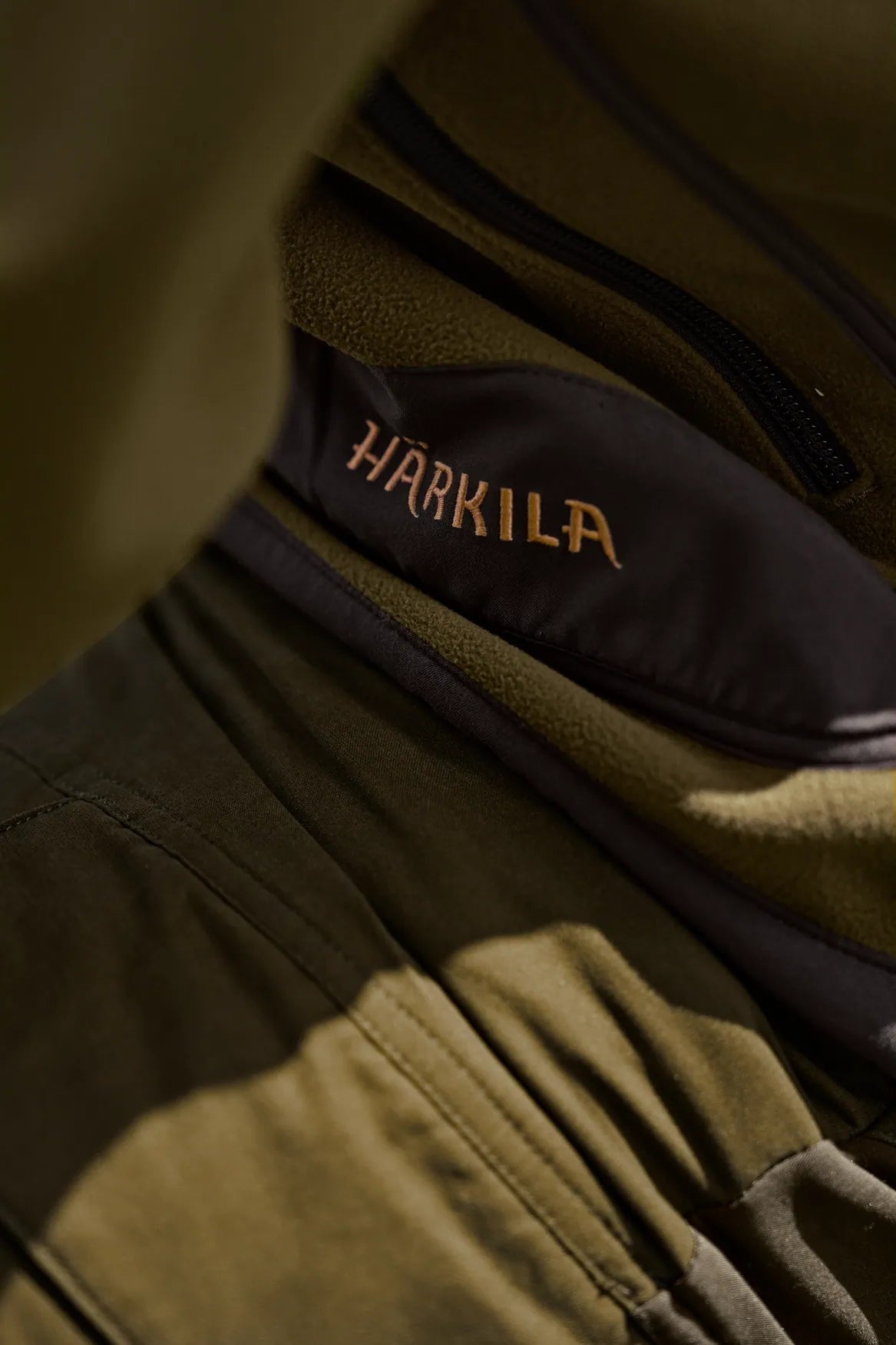 Härkila Kamko Fleece Reversible, dark olive/Arabian spice