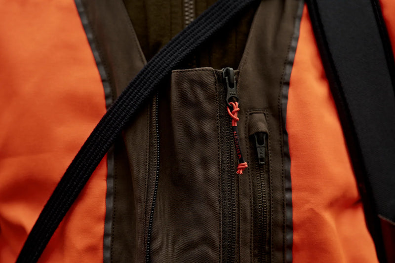 Afbeelding laden in Galerijviewer, Härkila Wildboar Pro Blaze Waistcoat, orange blaze/brown
